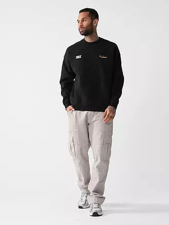 ANOTHER COTTON LAB | Pullover Oversized Fit OUT OF OFFICE | schwarz