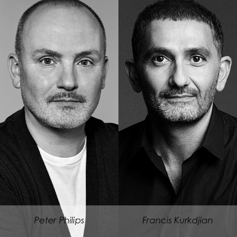 Zwei schwarz-weiße Porträtfotos nebeneinander. Links eine Person mit kurzen Haaren und gestutztem Bart. Rechts eine Person mit kurzen Haaren und Vollbart. Beide tragen dunkle Kleidung. Unter jedem Porträt sind ihre Namen angegeben.