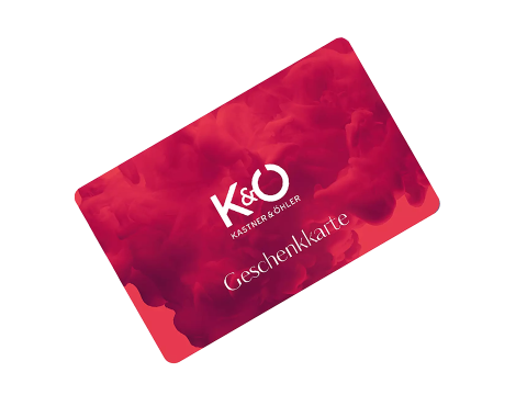 Eine rote Geschenkkarte mit marmorierter Textur, auf der der Text „K&Ö“ und „Geschenkkarte“ in Weiß zu sehen sind.