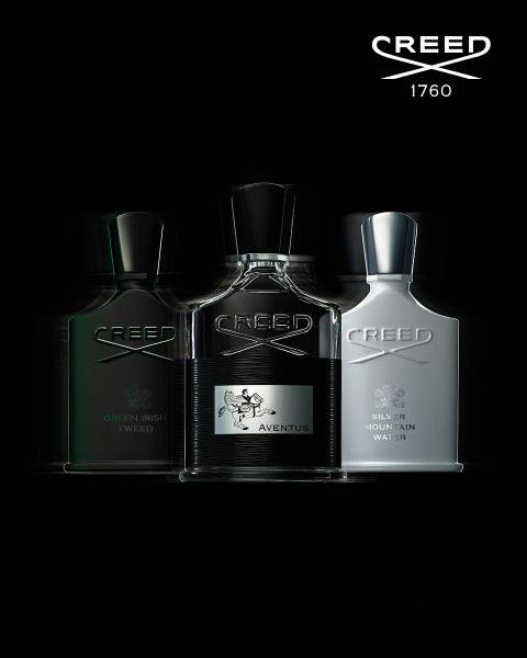 Drei Creed-Parfümflaschen – Green Irish Tweed, Aventus und Silver Mountain Water – werden nebeneinander vor einem schwarzen Hintergrund mit dem Creed-Logo und „1760“ oben rechts angezeigt.