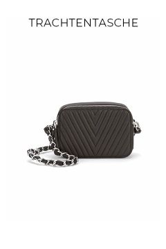 Eine kleine schwarze, gesteppte Umhängetasche mit Chevron-Muster und Kettenriemen auf weißem Hintergrund. Das Wort "TRACHTENTASCHE" erscheint über der Tasche.