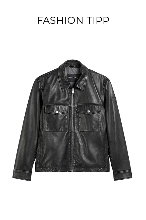 Schwarze Lederjacke mit einem Frontreißverschluss, zwei Brusttaschen mit Klappen und Knöpfen sowie langen Ärmeln. Der Text "FASHION TIPP" erscheint über der Jacke auf weißem Hintergrund.