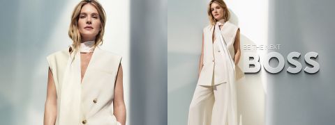 Eine Frau in einem eleganten weißen Anzug posiert selbstbewusst; neben ihr steht in fetten Buchstaben "BE THE NEXT BOSS".