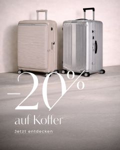 Zwei große Koffer, ein beiger und ein silberner, stehen nebeneinander. Der Text lautet: "-20% auf Koffer. Jetzt entdecken", was auf einen Rabatt von 20 % auf Koffer hinweist.