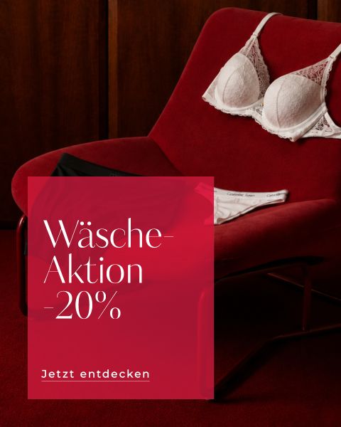 Ein roter Stuhl mit weißer Dessous- und Unterwäsche sowie ein Werbetext auf Deutsch, der 20 % Rabatt auf Dessous verspricht.